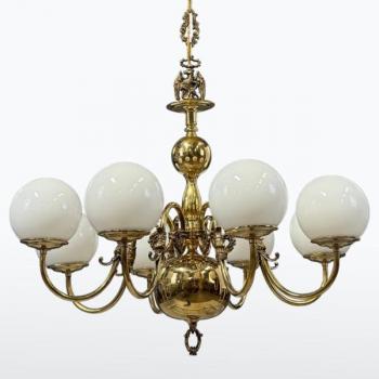 Mosazný osmiramenný lustr Mosazný osmiramenný lustr